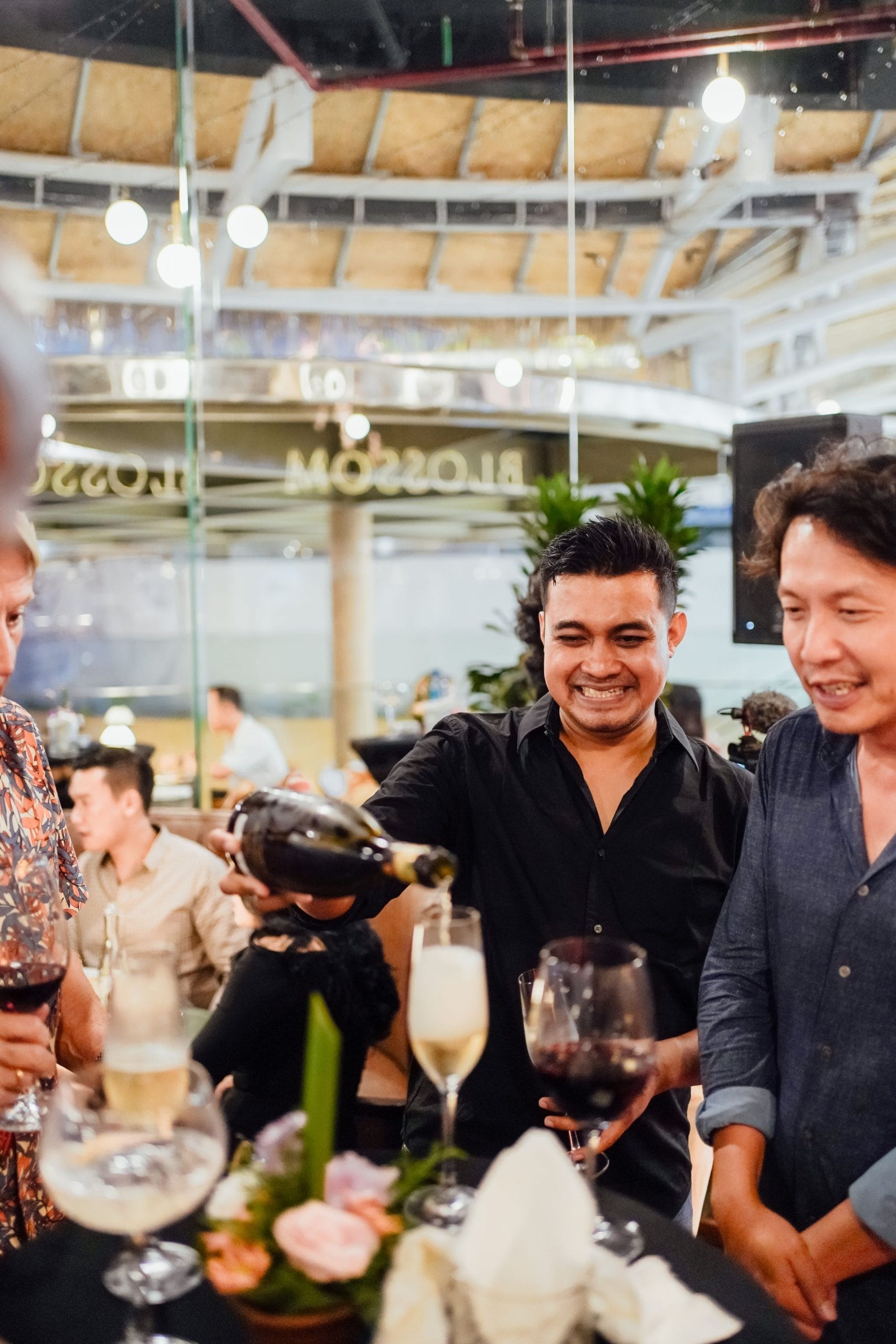 A hired bartender pouring drinks at an event in Bali
