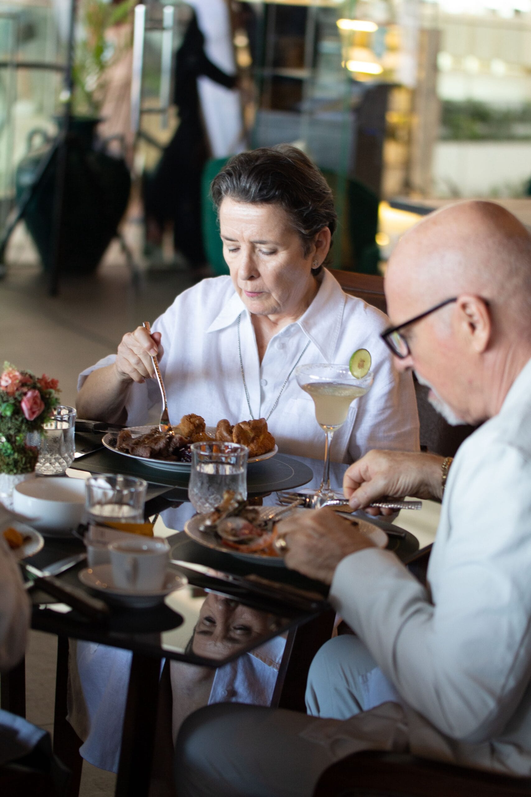A couple enjoying a spread of catered food at an event in Bali